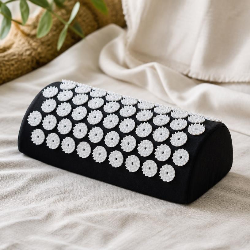 The spiked acupressure neck pillow in black